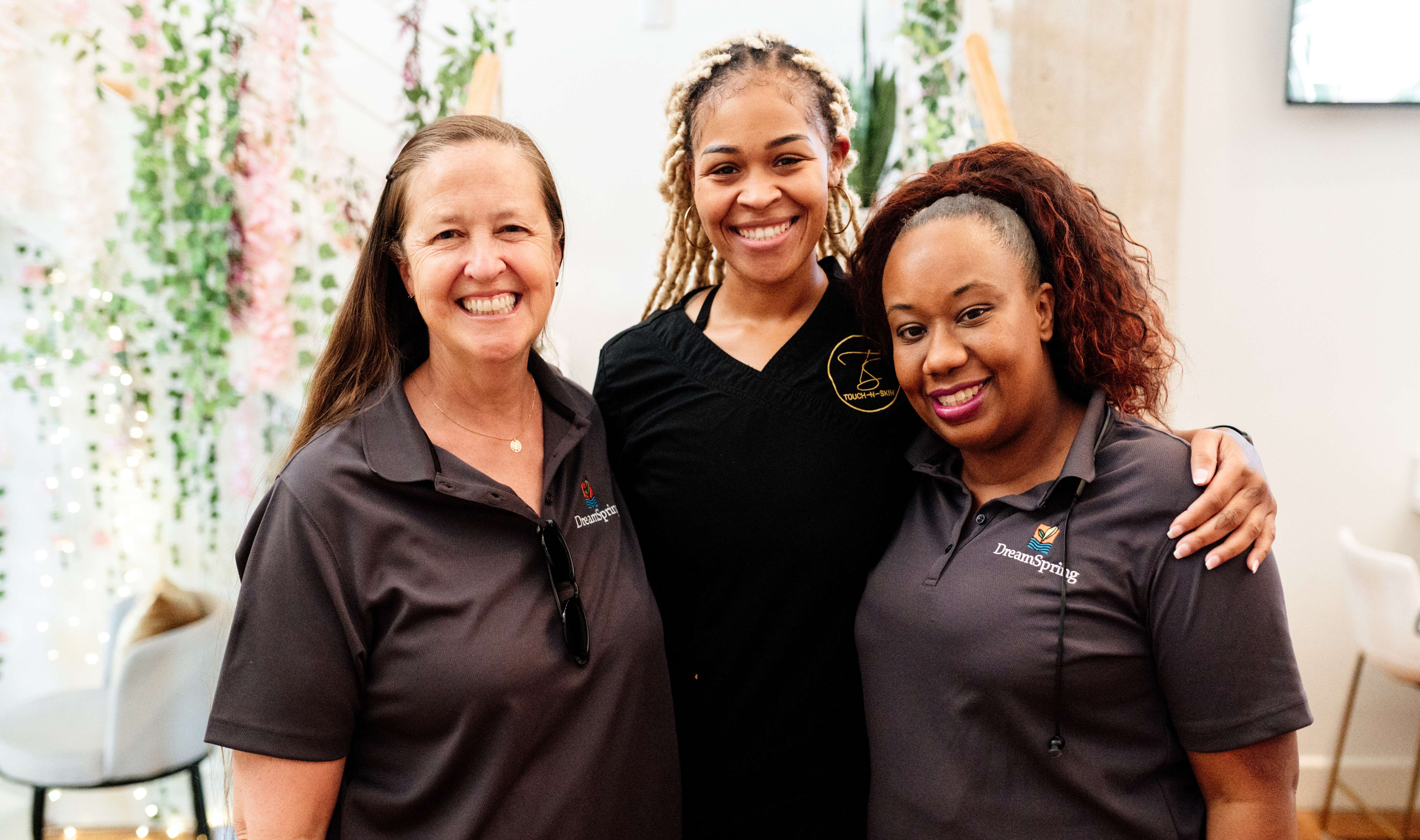 Anne Haines (President/CEO), Taylor Symone (Owner, Touch-N-Skin), and Shaundra Jacobs (Community Lending Officer)